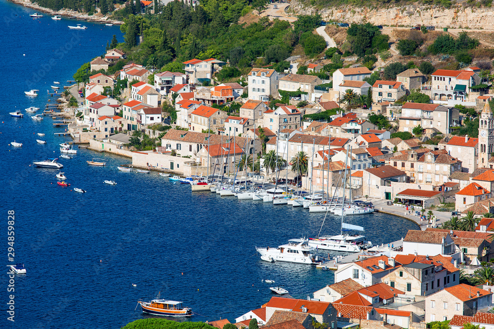 Aerial city view, typical Mediterranean architecture, port for yachts and ships, Vis, Croatia