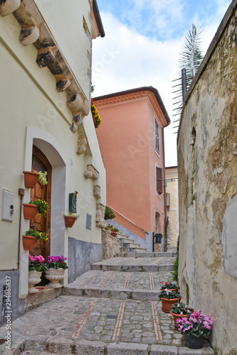 Fototapeta Naklejka Na Ścianę i Meble -  Monte San Biagio, Italy, 03/24/2018. A street among the old houses of a village in the Lazio region.