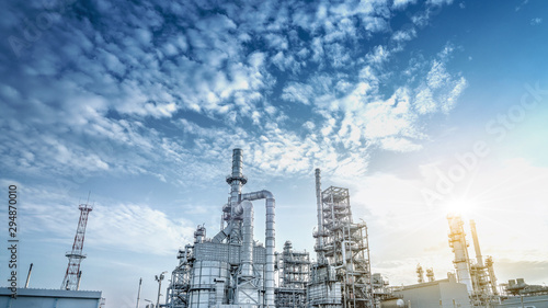 Close up Industrial view at oil refinery plant form industry zone with sunrise and cloudy sky