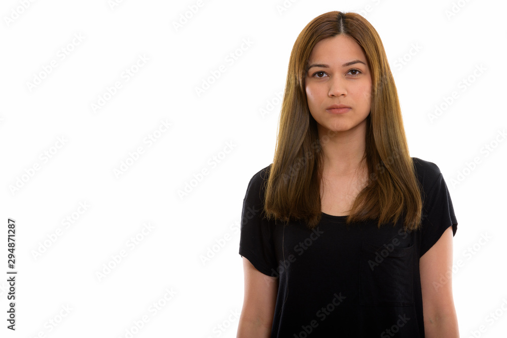Studio shot of young beautiful woman isolated against white background Studio shot of young beautiful woman isolated against white background