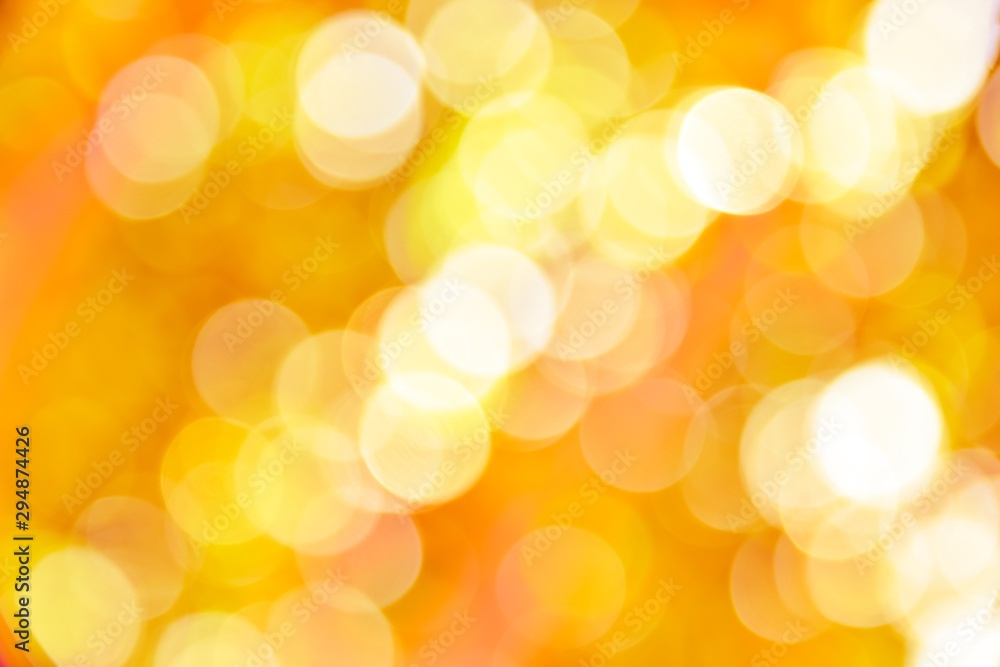 Fototapeta premium Abstract blurred foliage and bright summer sunlight.Abstract bokeh, Halloween theme.