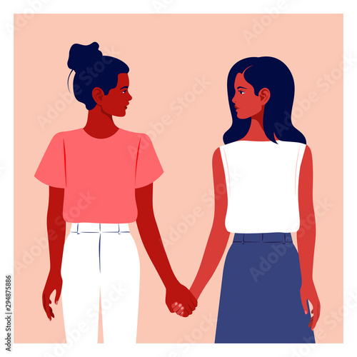 Two girls hold hands. Girlfriends. Two schoolgirls are looking at each other. Teenagers and students. Sisterhood. Feminism. Vector flat illustration