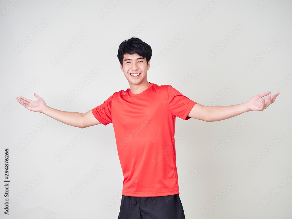 Young man sports player stretching and exercising Young man sports player stretching and exercising