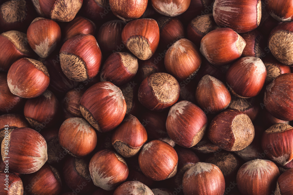 Hazelnuts. Stack of hazelnuts. Food background. Hazelnuts texture. Top view Hazelnuts. Stack of hazelnuts. Food background. Hazelnuts texture. Top view