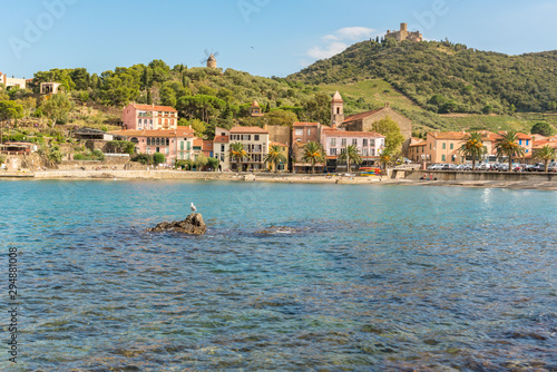 Coliure, France :  2019 Octobre 05 : Beautiful autumn day in the tourist city of Colliure in Occitania whit on back the church of Notre dames des Anges, France. photo