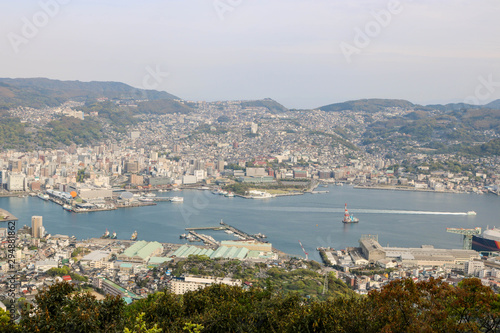 Landscape view of top Mount Inasa in sunny day with Nagasaki city and blue sky and mountain