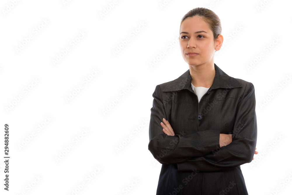 Studio shot of young beautiful businesswoman thinking with arms Studio shot of young beautiful businesswoman thinking with arms
