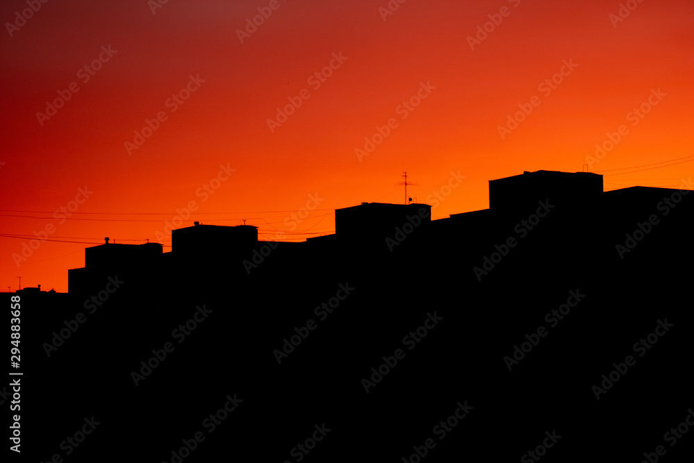 silhouette of the city at sunset