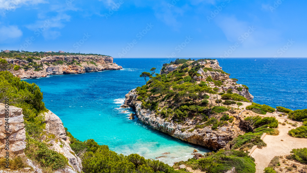 Panorama of beautiful beach and bay with turquoise sea water, Cala des Moro, Santanyi, Mallorca island, Spain