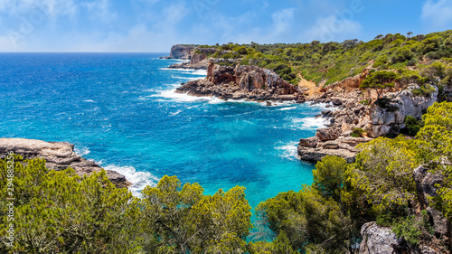 Panorama of beautiful beach and bay with turquoise sea water  Cala des Moro  Santanyi  Mallorca island  Spain