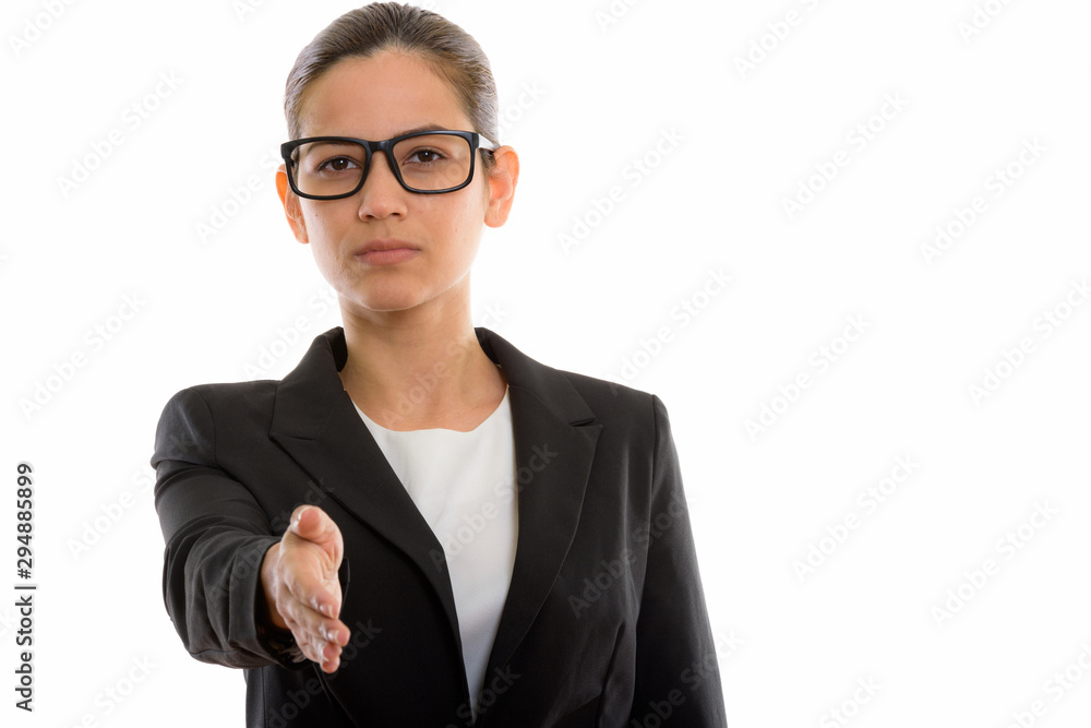 Studio shot of young beautiful businesswoman giving handshake Studio shot of young beautiful businesswoman giving handshake