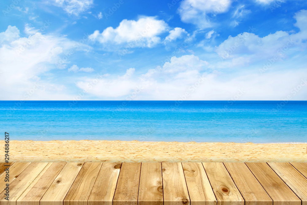 Fototapeta premium Wood table top on blue sea & sky background