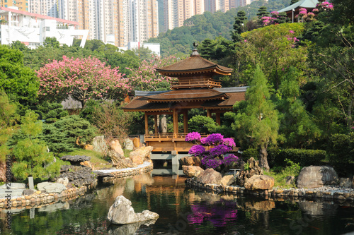 The oriental pavilion in Nan Lian Garden with many building background Kowloon  Hong Kong. Chi Lin Nunnery is a tourist attraction.