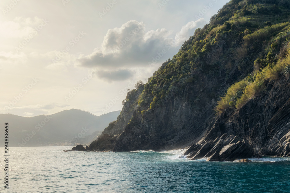 Aerial view of sea waves and fantastic Rocky coast and railway, Vernazza, Cinque Terre, Italy