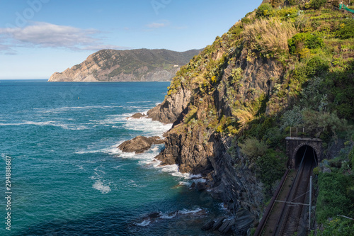 Obraz na płótnie Aerial view of sea waves and fantastic Rocky coast and railway, Vernazza, Cinque Terre, Italy w salonie