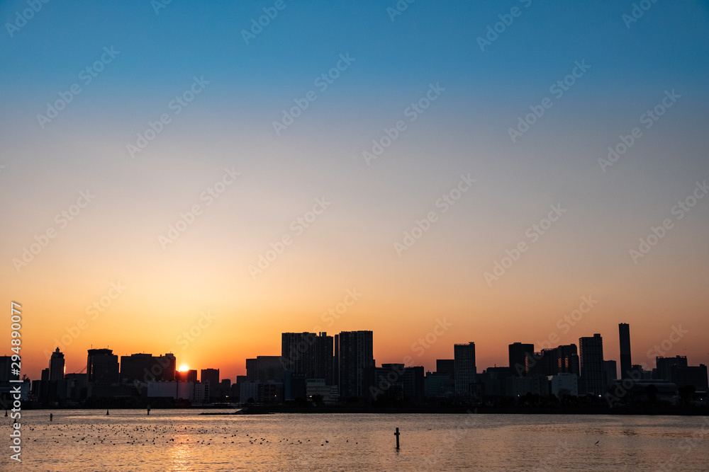 landscape beautiful city with sunset time and shadow of all tower and front of river 