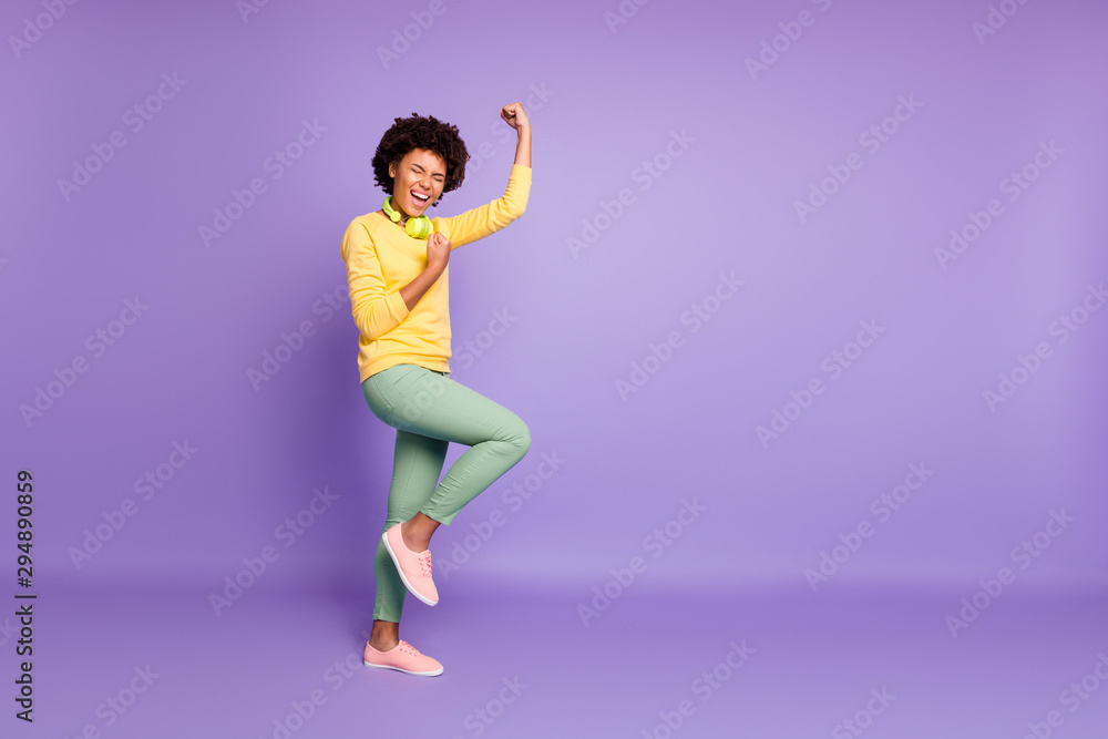 Full length body size view of her she nice attractive cheerful cheery crazy overjoyed dreamy wavy-haired girl listening music celebrating isolated over violet purple lilac pastel color background