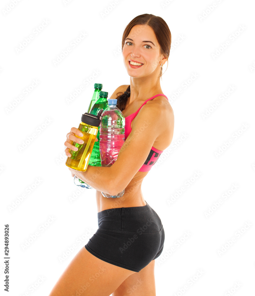 Young athletic model holding a lot of water bottles Young athletic model holding a lot of water bottles