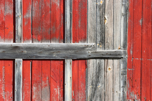 Red weathered barnwood siding with touches of weathered grey