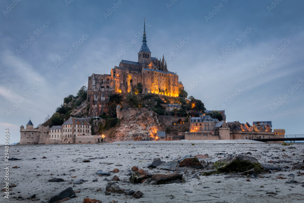 Evening closeup view on the illuminated Mont Saint Michel, France