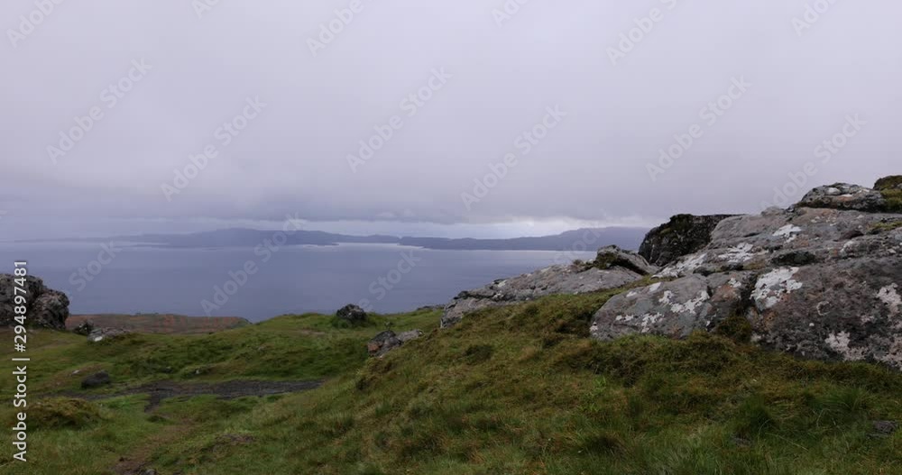 Old Man of Storr on the Isle of Skye in Scotland. Mountain landscape with foggy clouds. Old Man of Storr on the Isle of Skye in Scotland. Mountain landscape with foggy clouds.