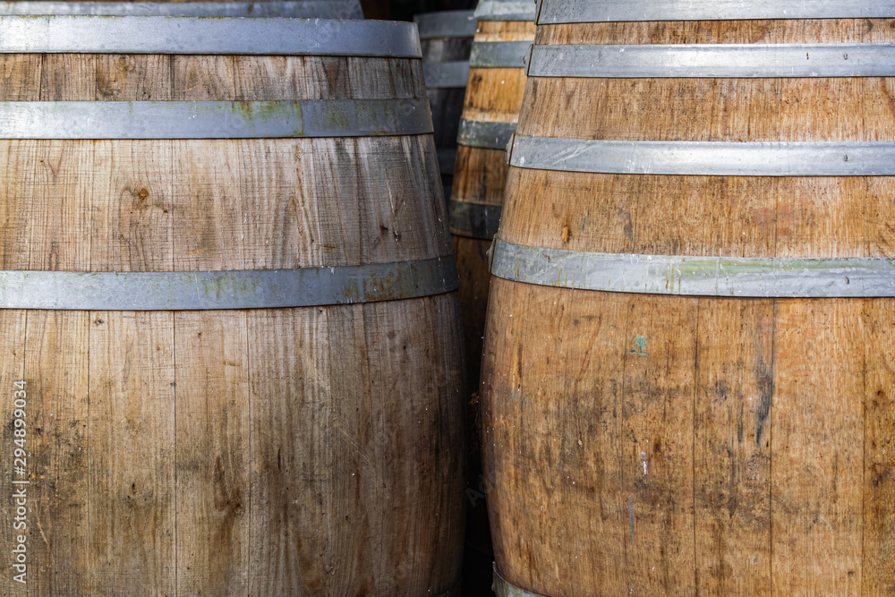 wine barrels close view, wooden texture background wine barrels close view, wooden texture background