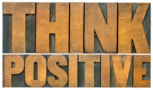 Think positive word abstract in wood type