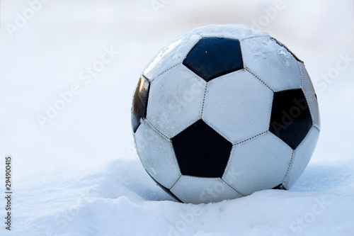Football, soccer ball on snow  © oasisamuel
