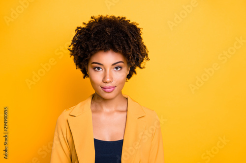 Close-up portrait of her she nice-looking attractive lovely charming pretty cute calm content wavy-haired girl isolated over bright vivid shine vibrant yellow color background