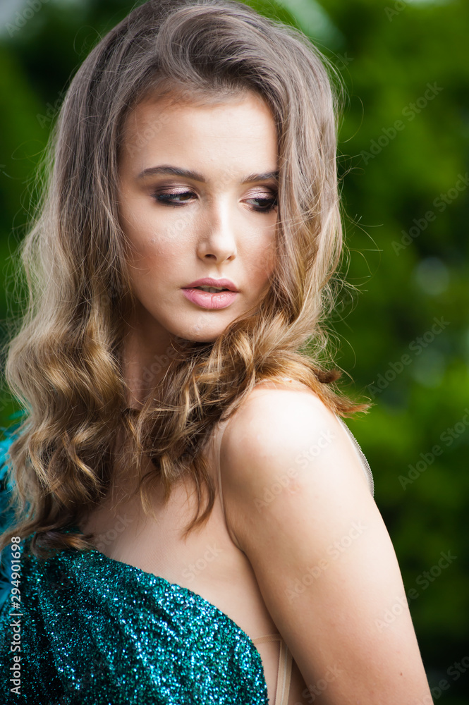 Portrait of beautiful woman in green evening dress Portrait of beautiful woman in green evening dress