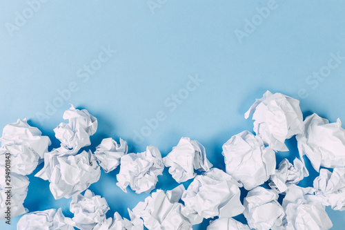 Close-up of Crumble paper isolated on blue background photo