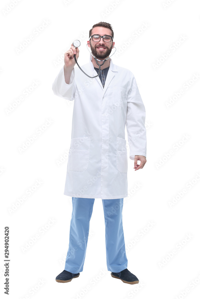 in full growth. General practitioner showing his stethoscope in full growth. General practitioner showing his stethoscope