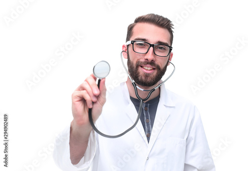 in full growth. General practitioner showing his stethoscope