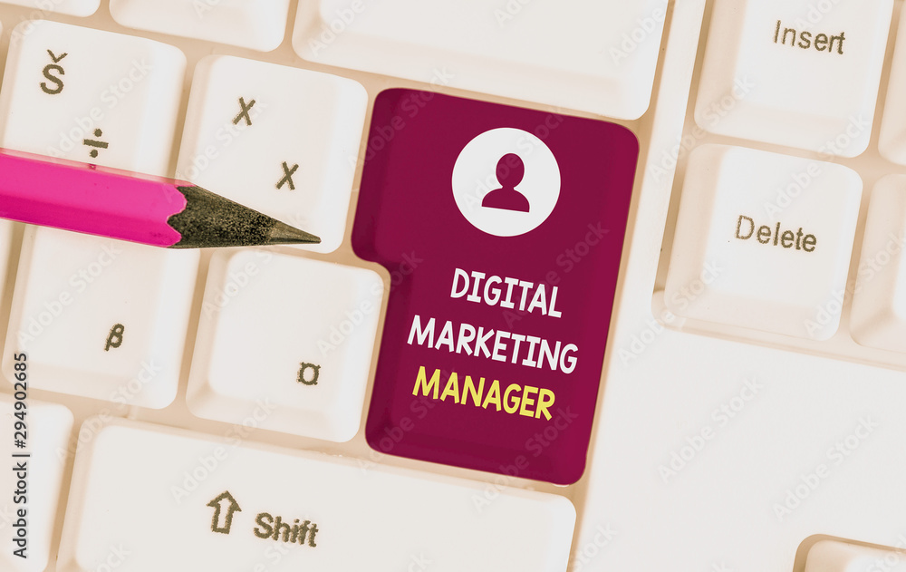 Conceptual hand writing showing Digital Marketing Manager. Concept meaning optimized for posting in online boards or careers White pc keyboard with note paper above the white background Conceptual hand writing showing Digital Marketing Manager. Concept meaning optimized for posting in online boards or careers White pc keyboard with note paper above the white background