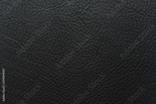 Black color grainy, heavy grain calf cow leather texture and background.