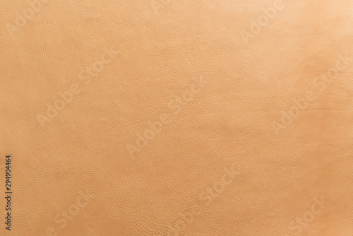 Tan, light, beige, natural color grainy, heavy grain calf cow leather texture and background.