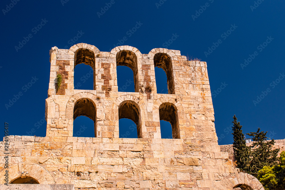 Beautiful landscape view of a part of the Acropolis of Athens, Greece on a sunny day with no clouds