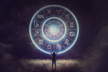 Woman raising hands looking at the night sky. Astrological wheel projection, choose a zodiac sign. Trust horoscope future predictions, consulting stars. Power of universe, astrology esoteric concept.