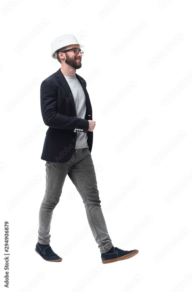in full growth. male architect confidently stepping forward in full growth. male architect confidently stepping forward