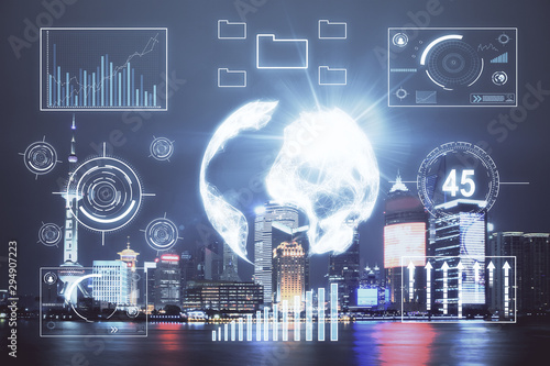 Financial graph on night city scape with tall buildings background double exposure. Analysis concept.