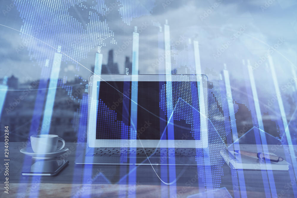 Forex Chart hologram on table with computer background. Multi exposure. Concept of financial markets.