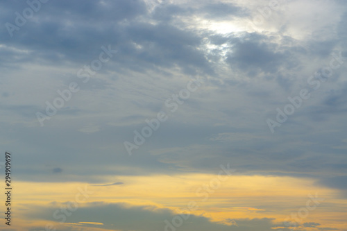Clear warm sky with white cloud background in the sunset time. warm light sky background.