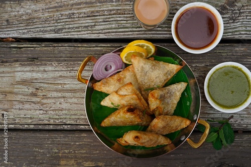 Homemade Samosas wiith Chutneys/Diwali snacks, selective focus photo