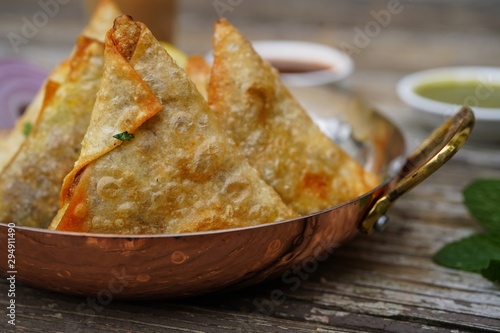 Homemade Samosas wiith Chutneys/Diwali snacks, selective focus photo