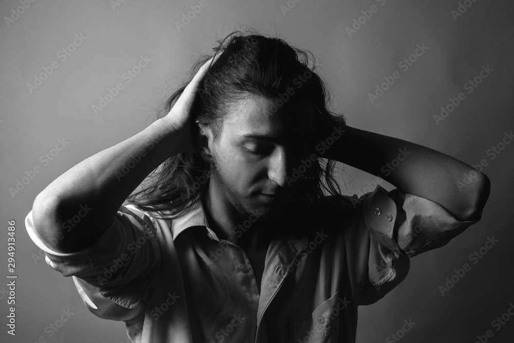 Portrait of sad young man. Black and white. Portrait of sad young man. Black and white.