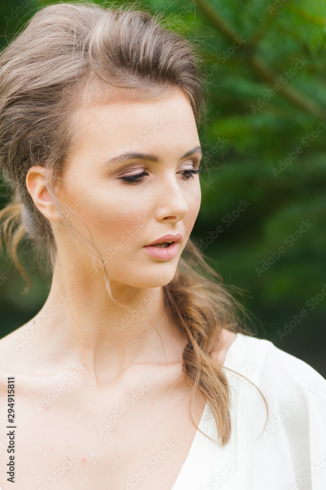 Portrait of beautiful bride with beautiful hairstyle and makeup Portrait of beautiful bride with beautiful hairstyle and makeup