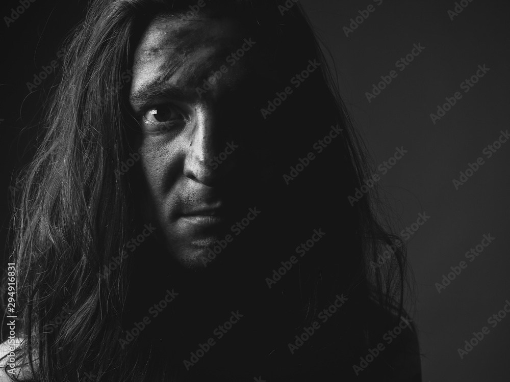 Portrait of angry young man in soot. Black and white Portrait of angry young man in soot. Black and white