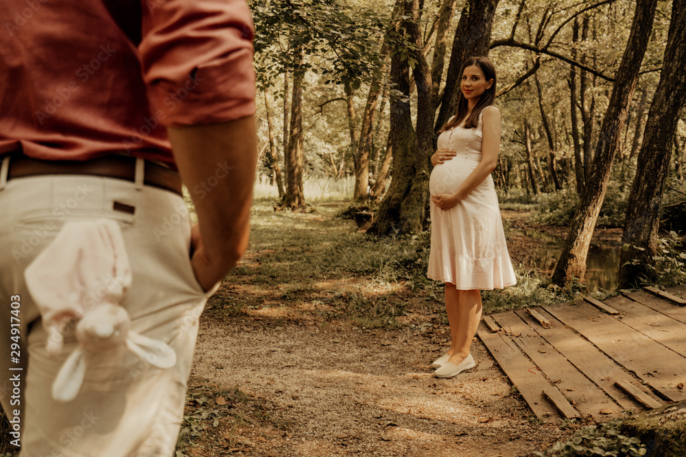 Fototapeta premium Romantic moments for pregnant couple