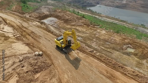 Concept of digging in some part of the soil in order to fill some soil in the area To be used to build a house