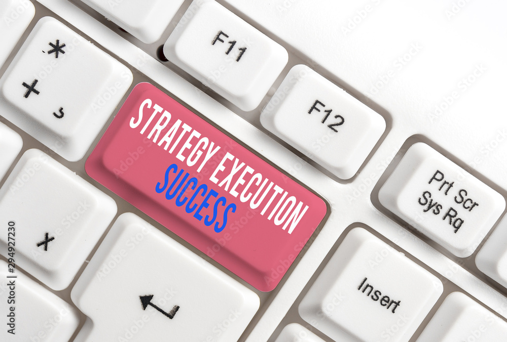 Text sign showing Strategy Execution Success. Business photo showcasing putting plan or list and start doing it well White pc keyboard with empty note paper above white background key copy space Text sign showing Strategy Execution Success. Business photo showcasing putting plan or list and start doing it well White pc keyboard with empty note paper above white background key copy space